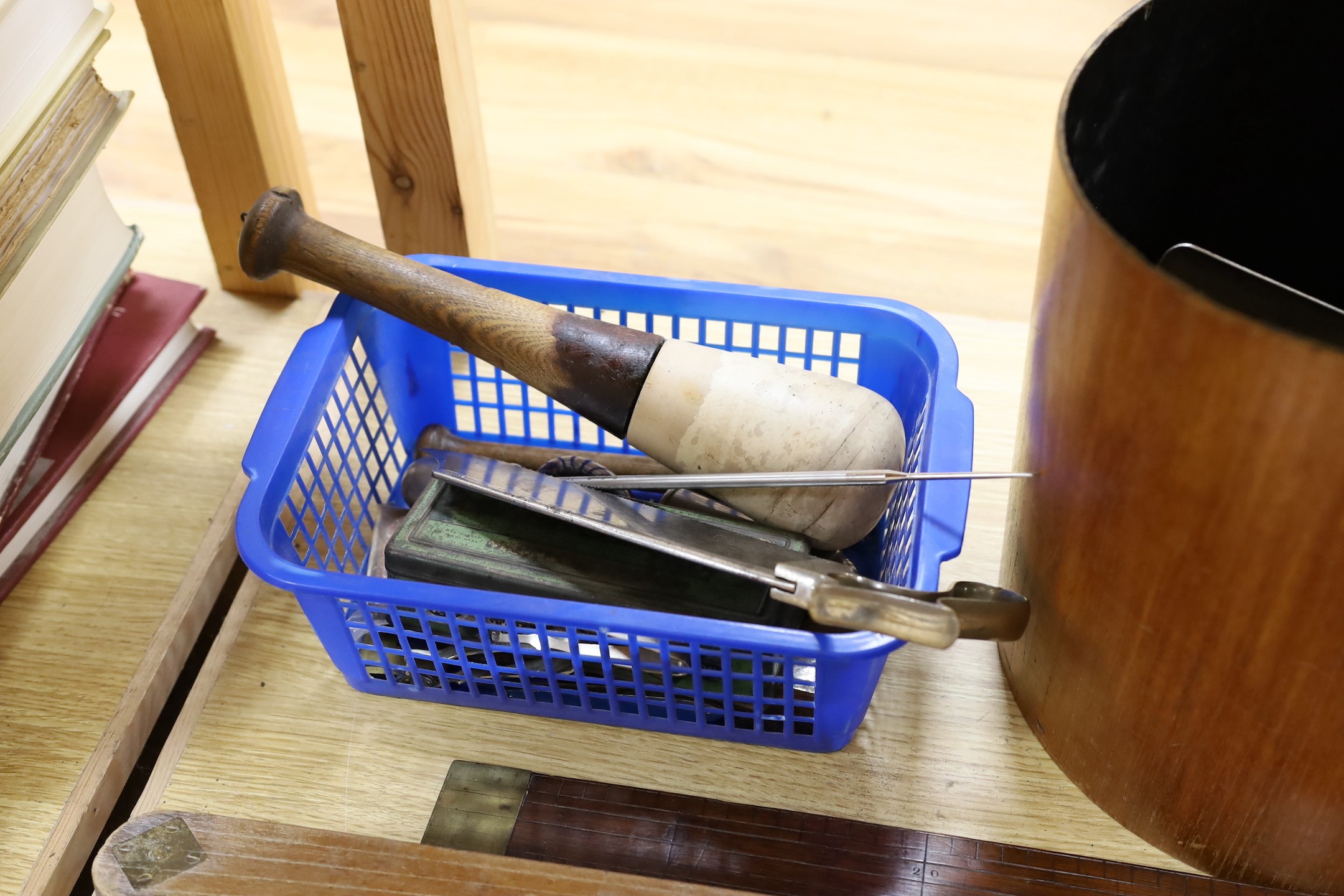 A leather writing box, a collection of wooden rulers, a small collection of wood working and surgeon’s tools etc